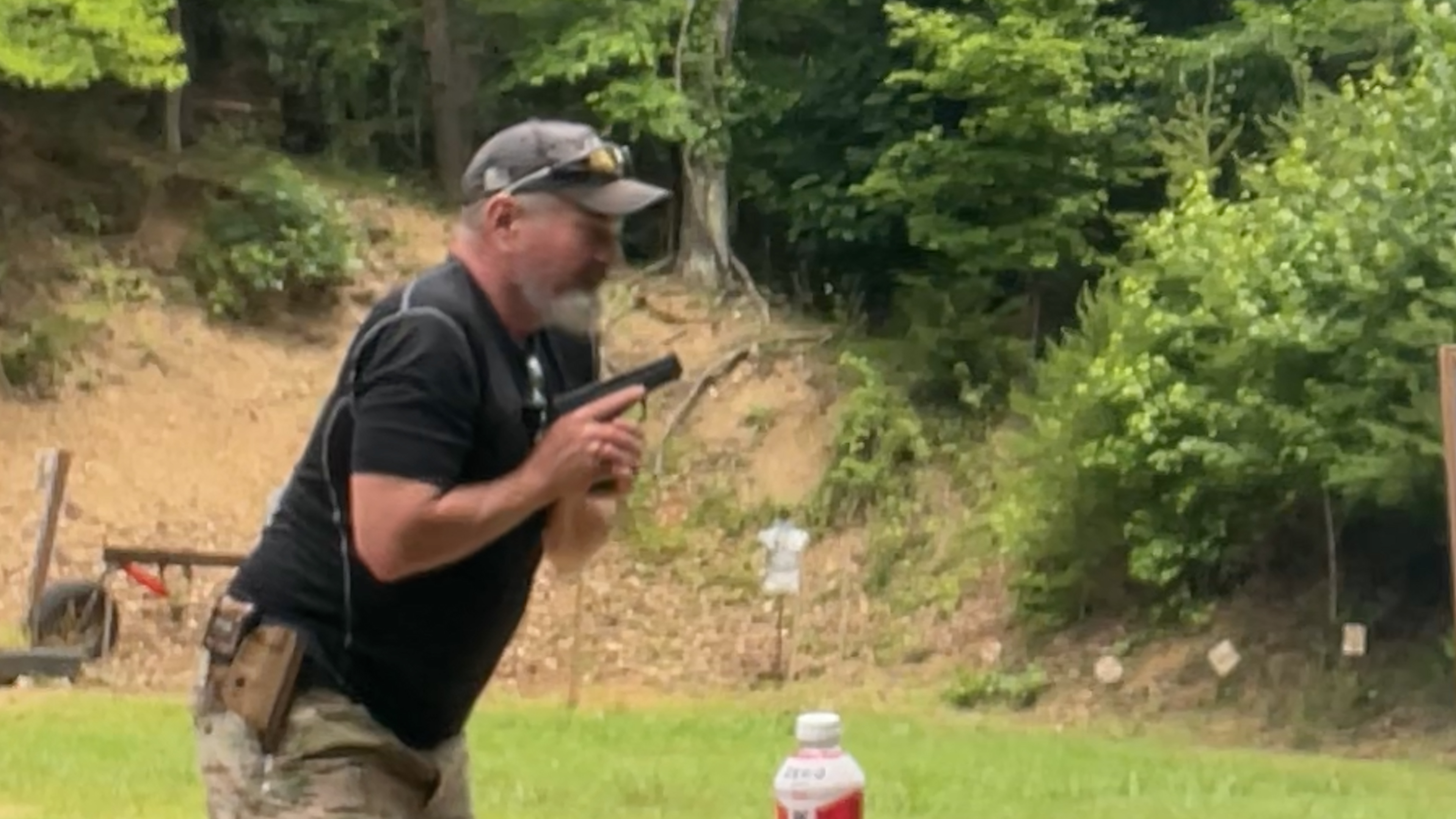 Shooter engaging steel targets