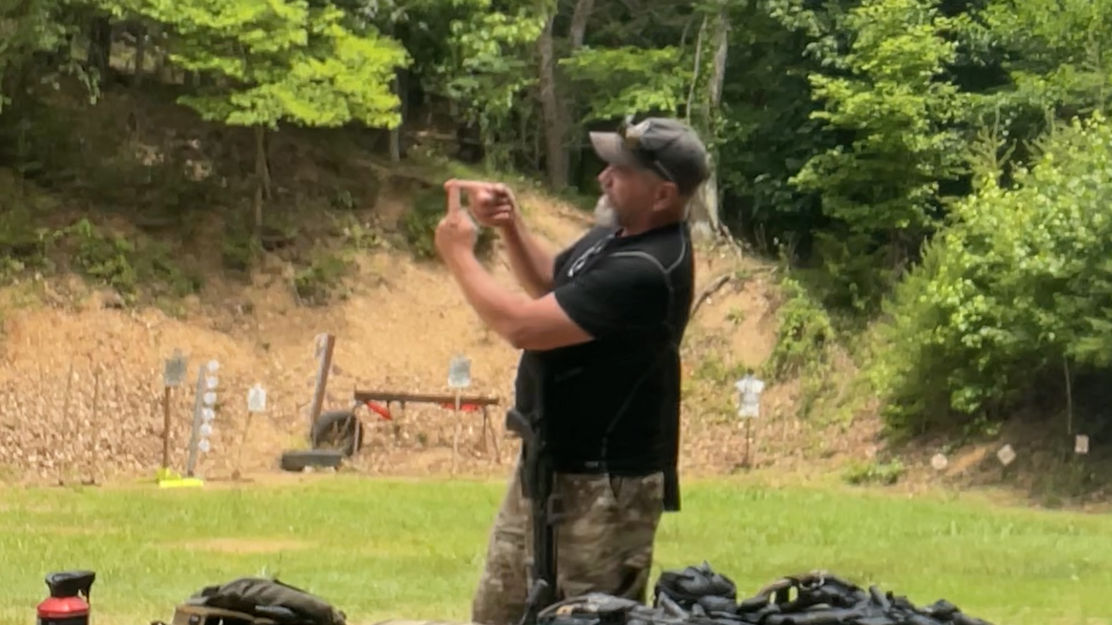 Instructor demonstrating trigger control